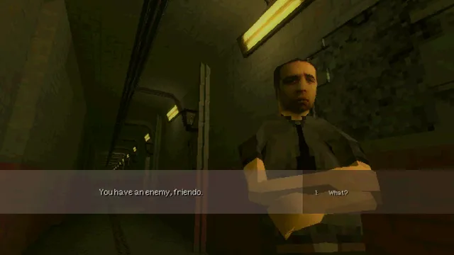 A man with a pixelated face in a dark corridor saying: You have an enemy, friendo