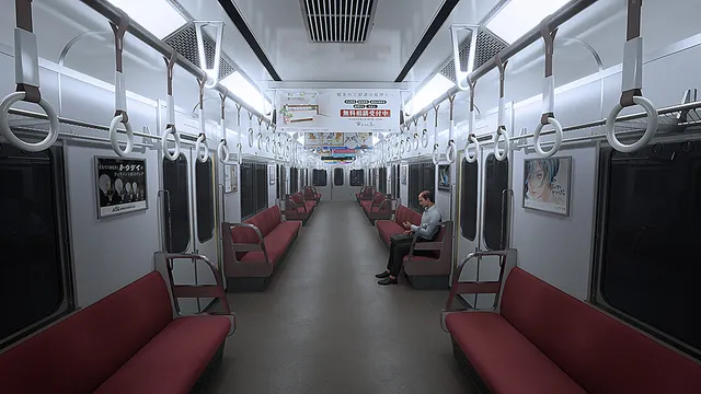 Platform 8 screenshot: the length of an empty-feeling commuter carriage with red seats, hanging straps and one seated passenger