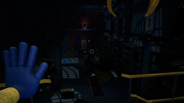Poppy Playtime screenshot: the GrabPack hand raised in a dark storeroom with shelves, railings and a conveyor