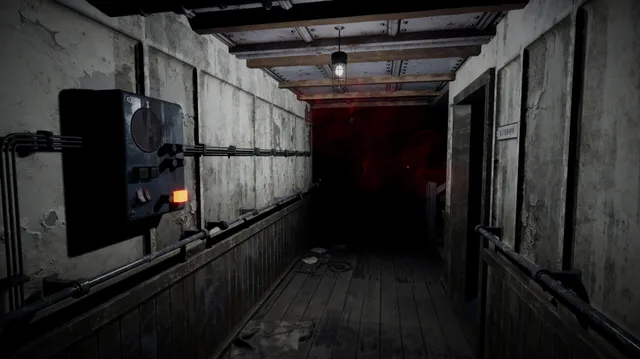 A peeling hallway with a fuse box on the wall and red mist gathering at the far end