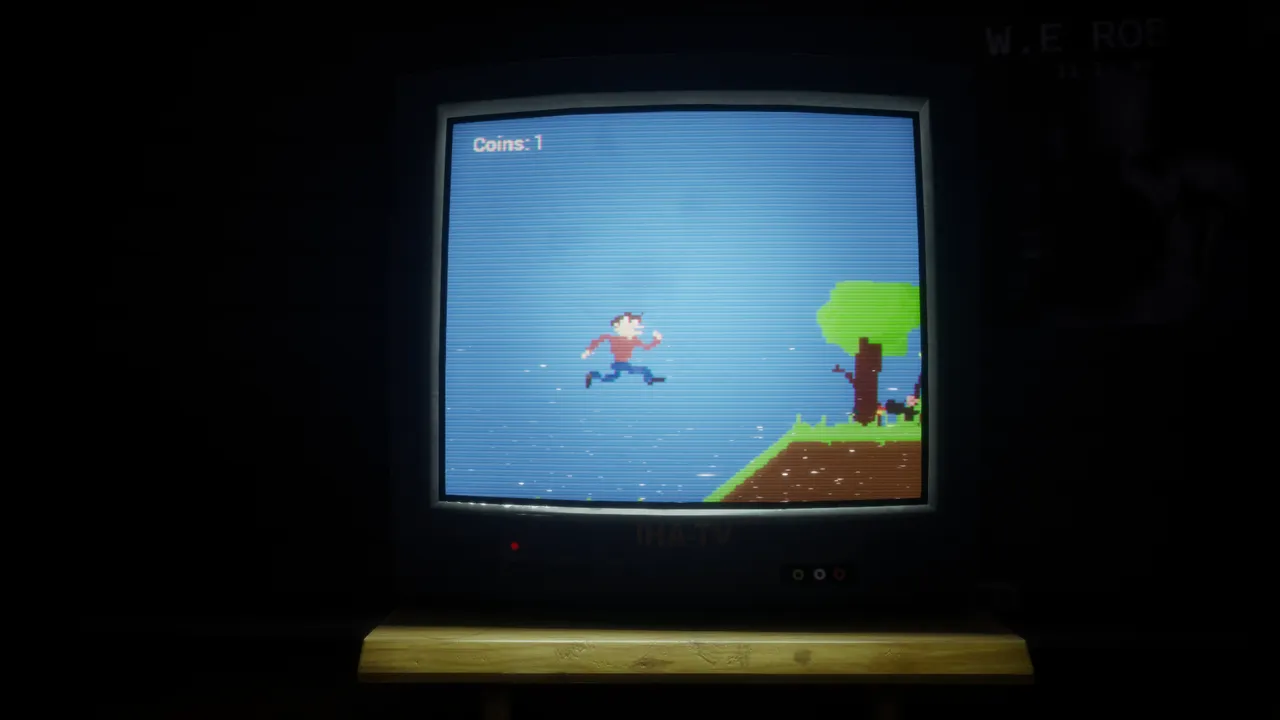 An old CRT on a wooden bench in a dark room showing a little character running across a blue sky and green hill