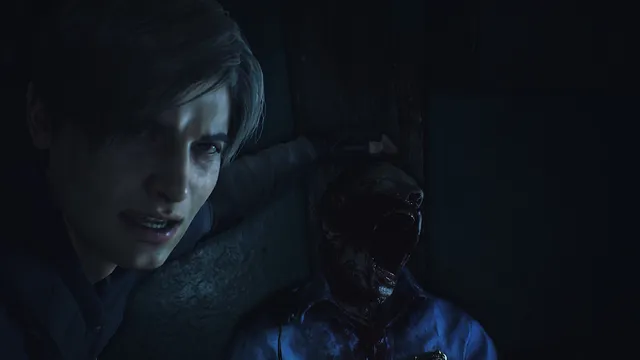 Resident Evil 2 screenshot: a bloody zombie bites at Leon as he struggles against a wall