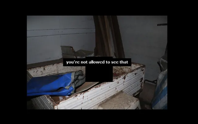ROAM0120.exe screenshot: a flash photo of a rusted metal container and a blue tarp in a shed, with part of it blacked out under the words you're not allowed to see that