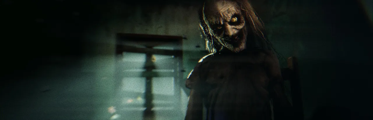 SHE WAS 98 art: a grey-haired old woman with a ghastly, grinning face looms in a dark room lit by a window