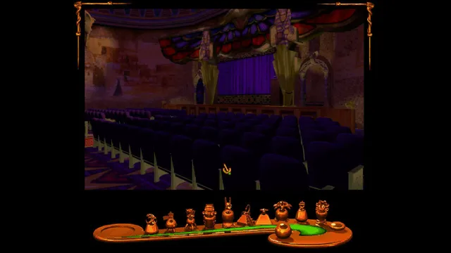 Shivers screenshot: rows of empty purple seats facing the curtained stage of the museum's abandoned theatre