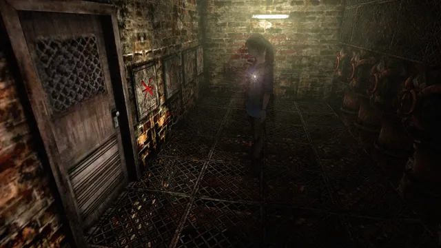 Abigail with a pocket flashlight in a narrow brick corridor with a grated floor and a door marked with a red cross
