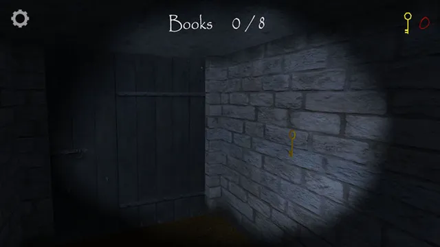 Slendrina: The Cellar screenshot: a key hangs on a stone wall beside a wooden door in the flashlight beam