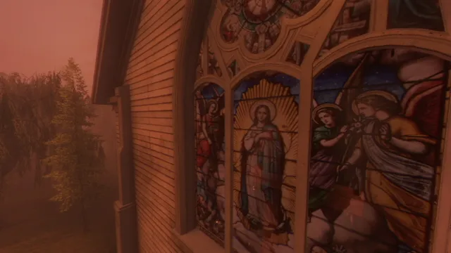 Tales Beyond The Tomb - The Last Vigil screenshot: stained-glass windows of the Virgin and angels on the side of the cemetery chapel in red fog