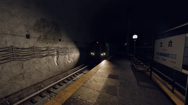 Tales of Fear - Episode Zero: an underground Japanese train platform at night as a train's headlights approach out of the tunnel