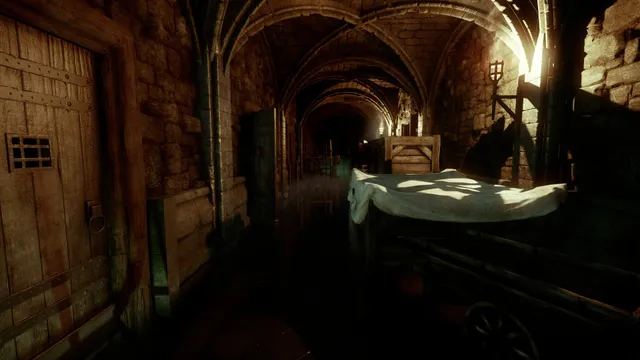 A vaulted stone dungeon corridor with a cloth-covered cart and an old wooden door