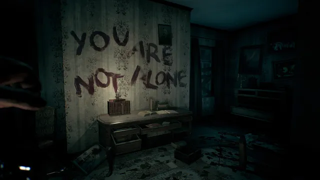 The Beast Inside screenshot: You are not alone written in red across the wallpaper of a ransacked study
