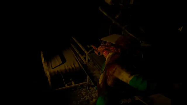 A bloodied creature in torn green clothes leans over hospital beds in the dark