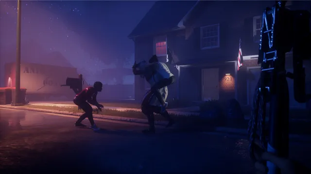 Two sleepwalking adults carry a figure along a misty suburban street at night, seen from behind a hedge