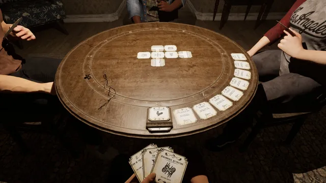 the cabin game screenshot: cards laid out on a round wooden table seen from above