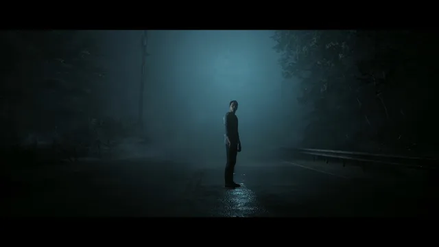 Little Hope screenshot: a lone figure stands on a wet road in thick blue fog between dark trees