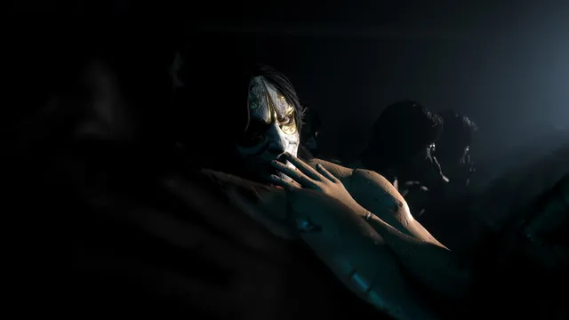 A figure in a cracked white and gold mask among pale bodies in the dark