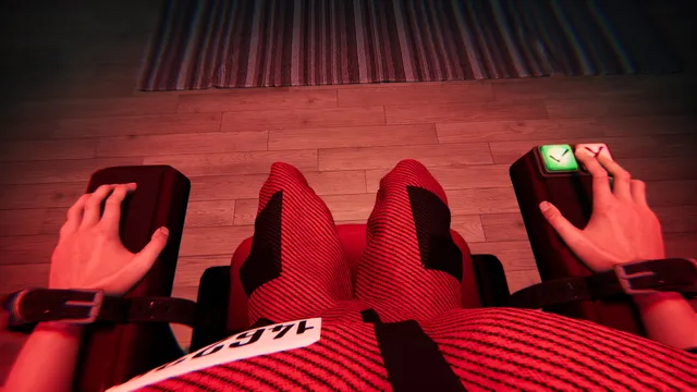 The Floor Above screenshot: first-person view of hands strapped to the chair arms, one finger on a green tick button, a number tag on the chest, in red light