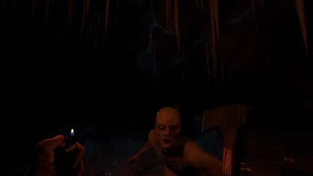 The Forest screenshot: by the light of a lighter in a cave, a hairless mutant crouches close while the player holds an axe