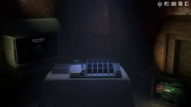 A dim room with the old machine on a table and a screen asking for a hand to be held to it