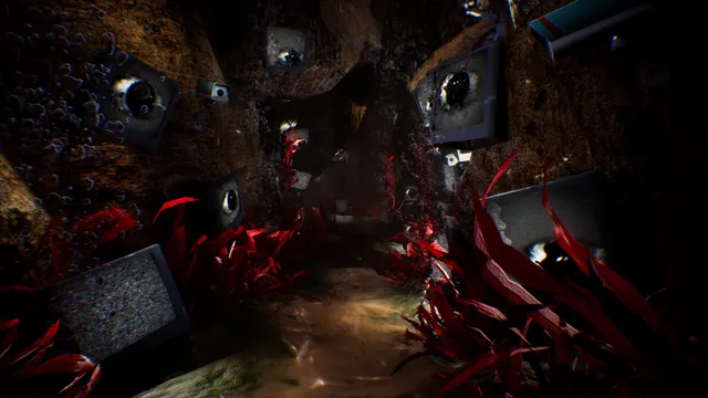 A nightmare tunnel of red growths lined with old television sets and staring eyes