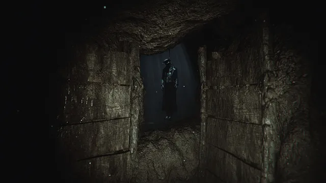 The Lightkeeper screenshot: a dark figure stands in the doorway of a rough stone passage