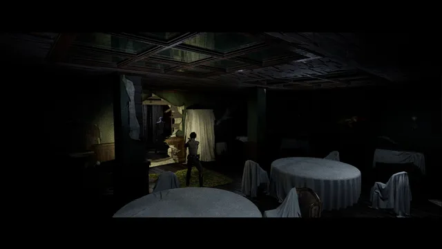 A dining room of tables under dust sheets in a dark hall