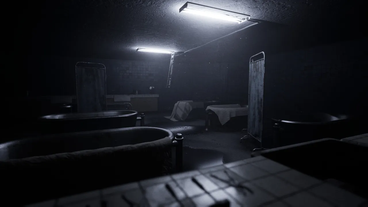 A dark institution room lit red by a ceiling lamp, with an old wheelchair and empty bed frames