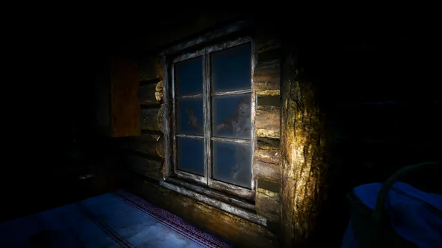 A shadowy creature presses against the window of a dark log cabin at night