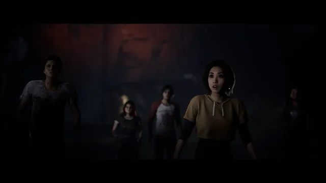 The Quarry screenshot: a group of frightened counselors stand together in the dark
