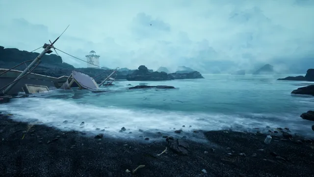 The Shore screenshot: a wrecked boat lies in the surf of a black-sand beach, a lighthouse on the headland beyond