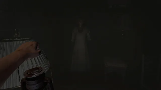Holding a lantern in a dark bedroom as a pale masked figure in a white dress stands in the corner