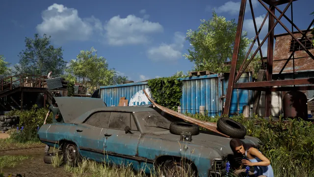The Texas Chain Saw Massacre screenshot: a victim crouches behind a rusted blue car in a junkyard by daylight