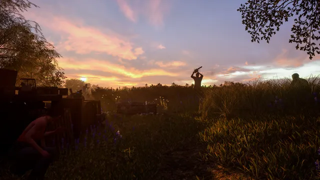 The Texas Chain Saw Massacre screenshot: a victim hides behind scrap at sunset as Leatherface raises his chainsaw in the field