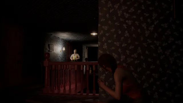 The Texas Chain Saw Massacre screenshot: a victim presses against a dark wall as a family member stands on the lit landing