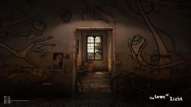 A doorway in a dark room whose walls are covered in large painted figures and eyes