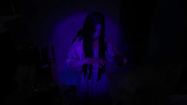 This is a Ghost screenshot: a girl with long black hair lit purple in a dark room