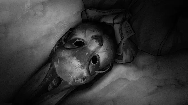 Tiny Bunny screenshot: a worn rabbit mask lying on a pillow