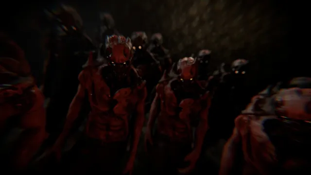 Total Chaos screenshot: a crowd of red, skinless creatures with glowing eyes presses forward in the dark