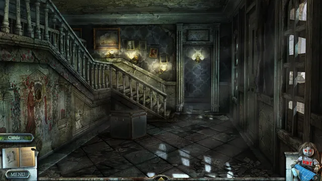 A decrepit entrance hall and staircase with stained walls