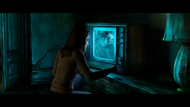 A woman kneeling before an old television with a cracked, glowing screen