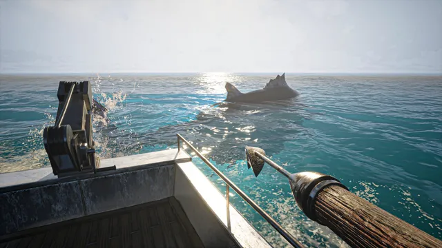 From the bow of the boat, a harpoon aimed at a large fin cutting through a bright blue sea