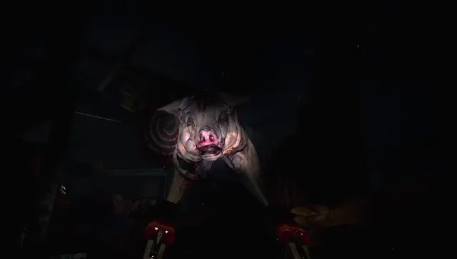 A grotesque pig-headed creature lunging out of the dark into the player's flashlight beams