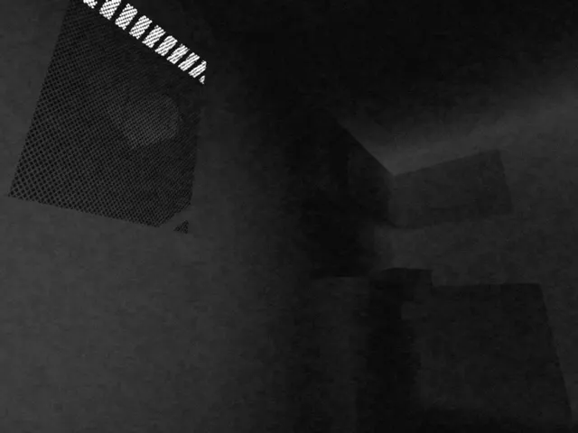 Which screenshot: a nearly black room in grainy grey, with a vent grille high on the wall and the dim shapes of furniture
