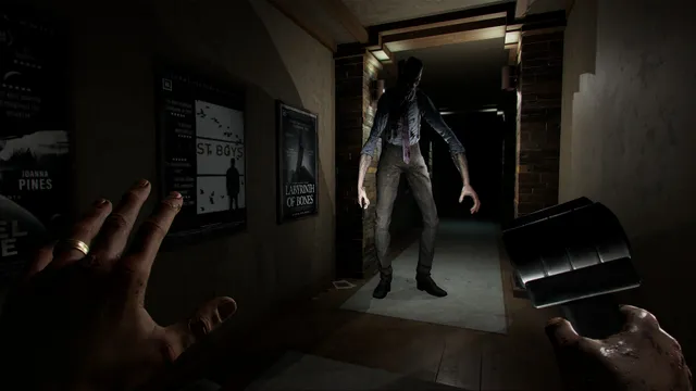 Wraith: The Oblivion - Afterlife screenshot: a tall, gaunt Spectre in a shirt and tie stands in a hallway lined with film posters, the player's hands raised